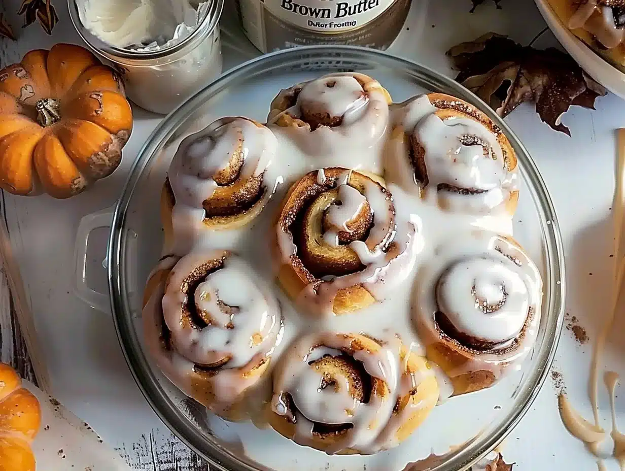 Delicious cinnamon rolls with brown butter frosting ready to serve.