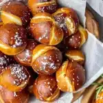 Freshly baked homemade pretzel bites served with mustard dip