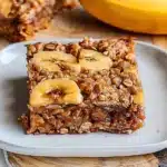 Healthy banana oatmeal bars baked with ripe bananas and oats