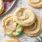 Classic soft and chewy sugar cookies on a cooling rack